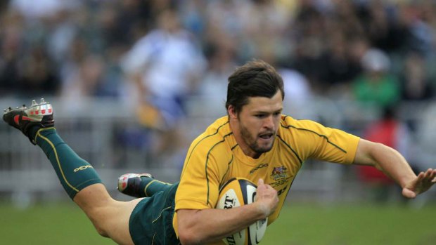 Adam Ashley-Cooper scores a try during the Wallabies' Bledisloe Cup match against the All Blacks last year.