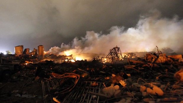 The remains of the fertiliser plant in West, Texas, burn after the explosion.