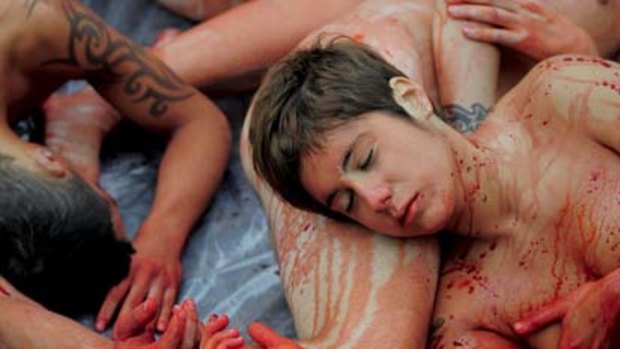 Animal rights activists AnimaNaturalis stage a naked protest against fur in Barcelona.