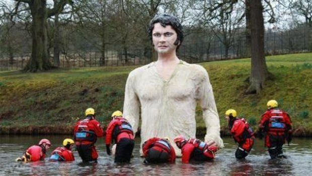 Firth things first: Divers rescue the polystyrene giant from Britain's Lyme Park. 