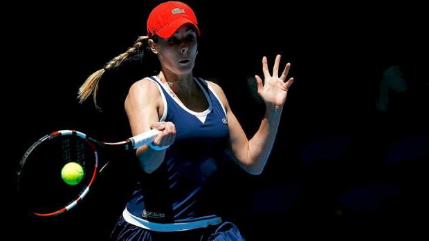 Alize Cornet of France plays a forehand to Anabel Medina Garrigues of Spain.
