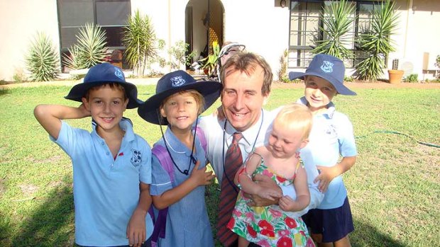 Being paid incorrectly ... Dr Stuart Downie with his children.