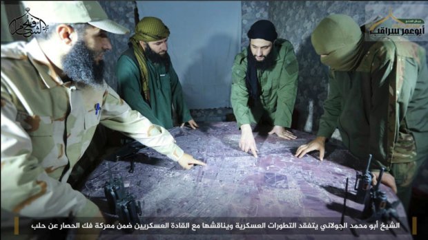 Members of the Fatah al-Sham Front, a group until recently formally allied with al-Qaeda which is fighting the Assad government, discuss the siege of Aleppo.