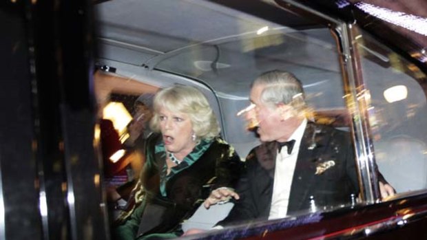 Shaken ... Prince Charles and Camilla in their car.