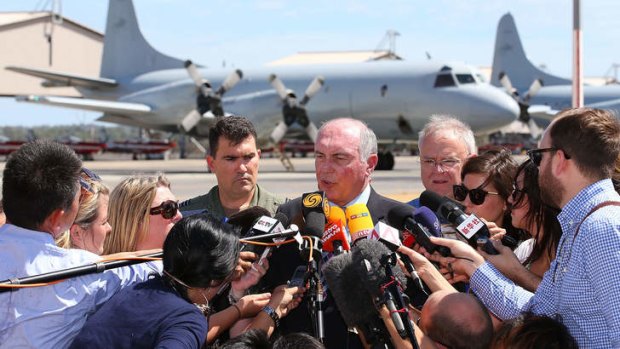 Acting Australian Prime Minister Warren Truss addresses local and international media about the search for possible Malaysian Airlines flight MH370 debris off the coast of Western Australia at an RAAF base in Perth;