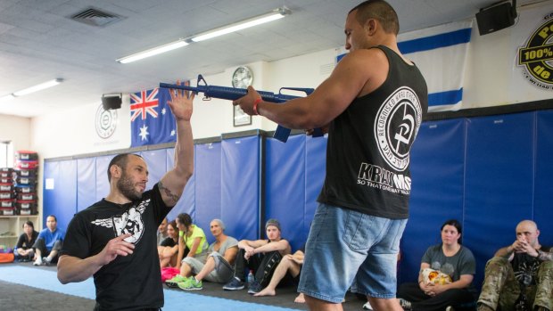 Lior Offenbach offers tip on disarming an attacker after a Krav Maga class at IDF Training in Caulfield.