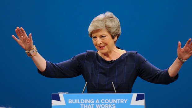 Prime Minister Theresa May addresses delegates in October.