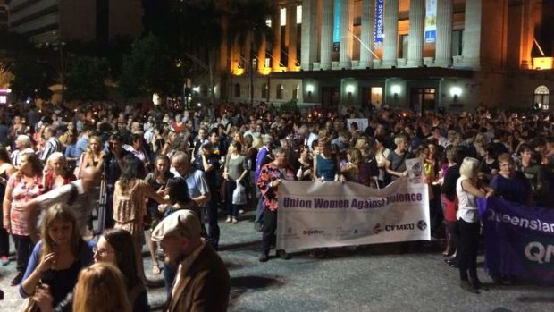 Crowds march from King George Square to Kurilpa Park for a vigil for slain student Sophie Collombet.