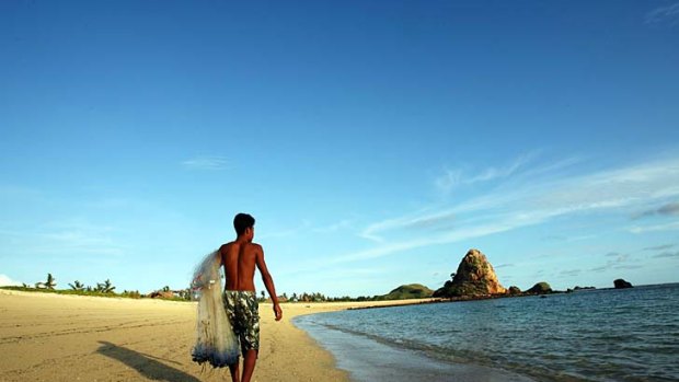 Eastern promise ... a local fisherman on Lombok's southern shore.