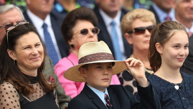Celebrating a wonderful life ...  Vivian, Tom and Beau Greig smile during the Tony Greig memorial service at the SCG on Sunday.