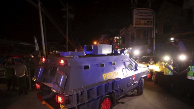 A Wolf armoured vehicle carrying Bali nine duo Andrew Chan and Myuran Sukumaran leaves Kerobokan prison to begin the transfer to Nusakambangan prison island where they are to be executed.