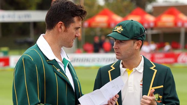 Graeme Smith and Michael Clarke get reacquainted before the coin toss.
