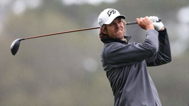 Aaron Baddeley of Australia hits a tee shot during the second round of the AT&T Pebble Beach National Pro-Am.