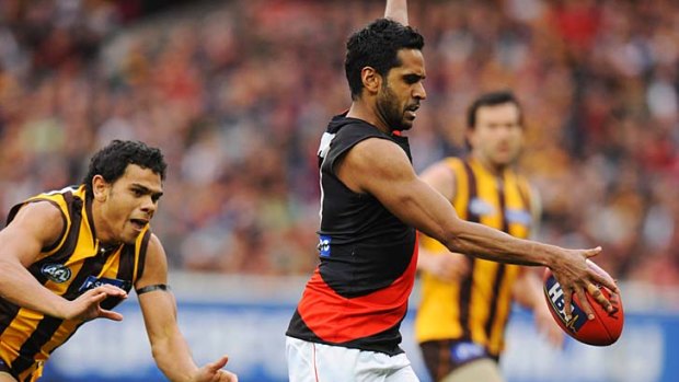 Essendon's Andrew Lovett show a clean pair of heels to Hawk Cyril Rioli, 29th August 2009.