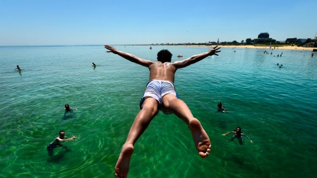 Get set to swelter, or find a way to cool off - like this young man at the Frankston Jetty.