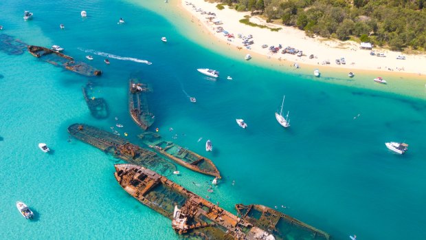Snorkel shipwrecks on the breathtaking coastlines of Moreton Island.