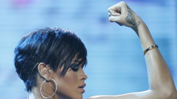 Measure of a man ... Rihanna sizes up potential suitors.