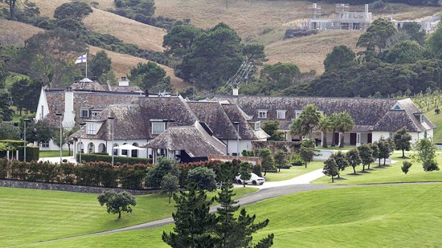 Police swooped on Kim Dotcom's rented mansion.