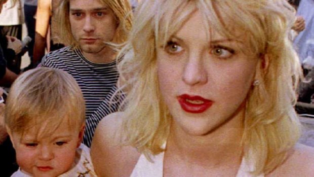 Kurt Cobain with wife Courtney Love and daughter Frances Bean Cobain at the MTV Music Awards in 1992.