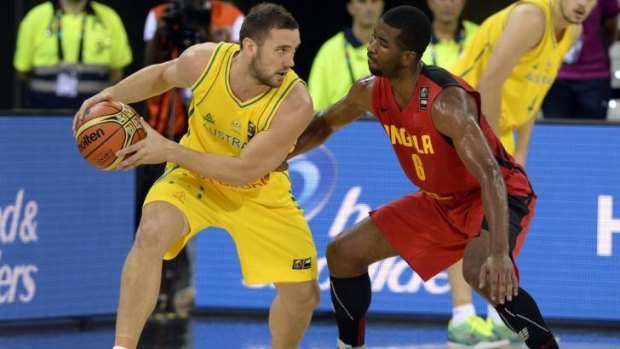 Australia's Chris Goulding vies with Angola's  Roberto Fortes during the match between the two countries on September 4.
