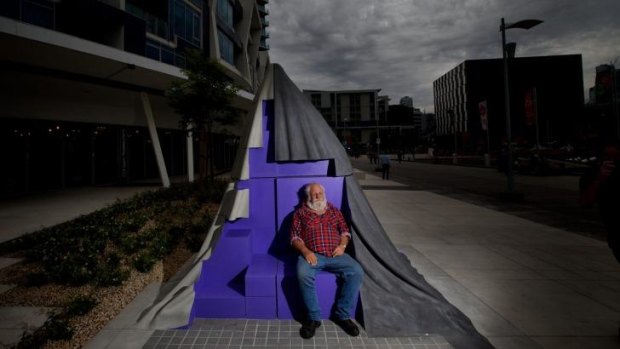 Angular geography: A member of the public enjoys the new Monument Park in New Quay, Docklands. 
