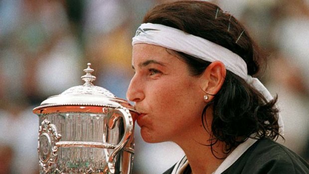 Won a fortune ... Spain's Arantxa Sanchez-Vicario kisses the cup after winning the French Open.