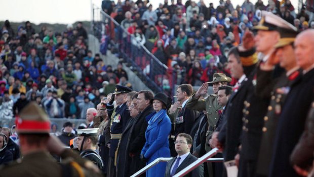 Dawn service &#8230; the Prime Minister, Julia Gillard, at Gallipoli yesterday. Corporal Ben Roberts-Smith, VC, stands behind her, saluting.