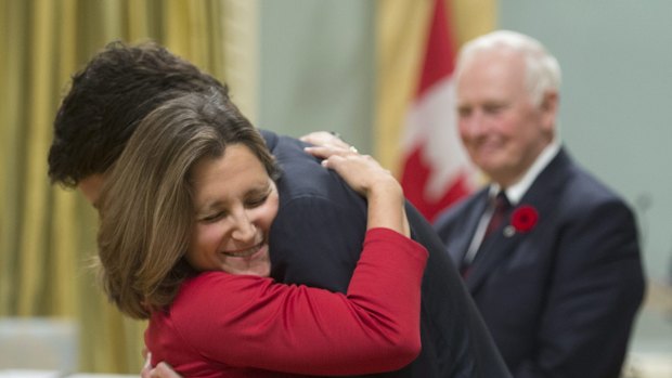 Justin Trudeau congratulates Chrystia Freeland as she is sworn in as Minister of International Trade at Rideau Hall in Ottawa.