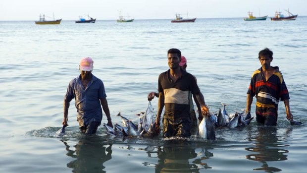 Fishermen with their catch.