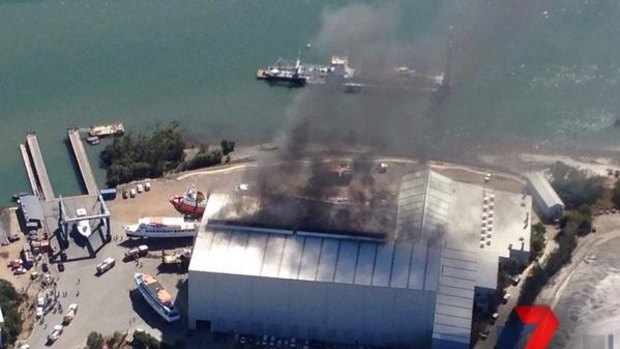 A boat goes up in flames at Hemmant, east of Brisbane.