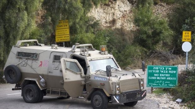 An Israeli military vehicle is deployed on one of the roads near Rosh Hanikra after the shooting.