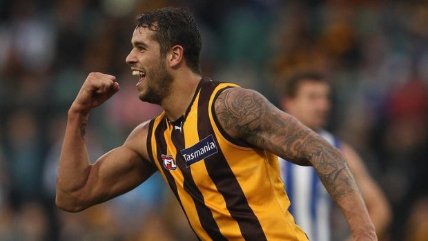 Lance Franklin celebrates a goal for the Hawks.