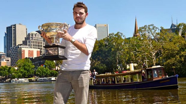 The man: Stan Wawrinka holds the trophy on Monday after his victory in the Australian Open men's final the previous night.