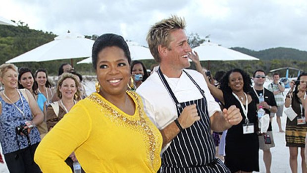 Oprah dances with chef Curtis Stone on Whitehave Beach.