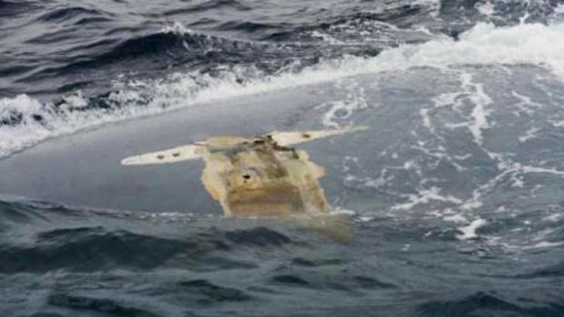The overturned hull of the Cheeki Rafiki is shown as discovered by a U.S. Navy warship.