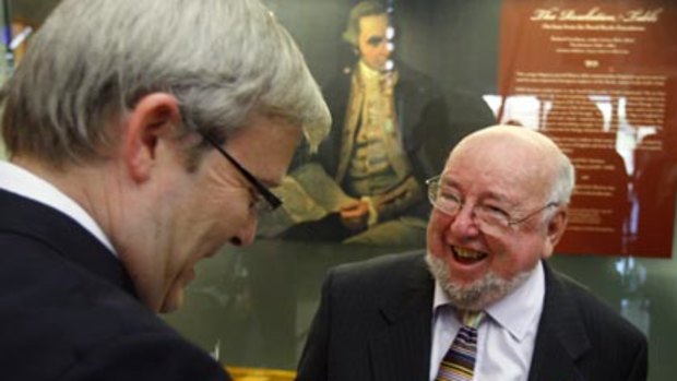 Howard baiting...the Prime Minister with the author Thomas Keneally at the launch of his book yesterday.