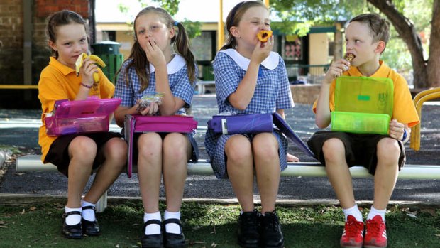 Choice is healthy: Abbie O'Toole, Eliza and Zoe Box and Austin O'Toole eat their lunches in Sydney this week.