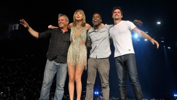 Taylor Swift with <i>Friends</i> actor Matt leBlanc, comedian Chris Rock and actor Sean O'Pry at her 1989 concert this week.