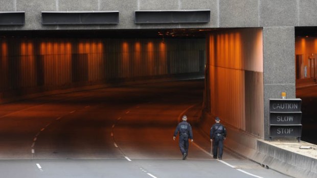 The Parkes Way tunnel in Acton, lit up in its trademark orange, during a police operation last year.
