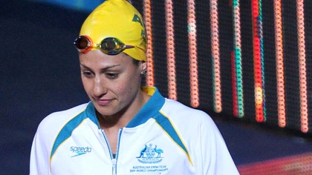 Rock star entrance ... Stephanie Rice arrives to compete in the semi-final of the women's 200-metre individual medley.