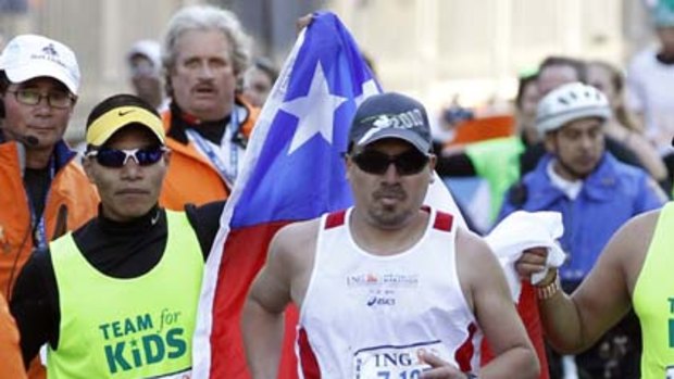 Chilean miner Edison Pena on his way to the finish line of the New York City Marathon on Sunday.