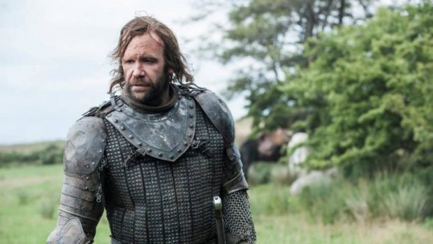 Lucky escape ... The Hound now has a price on his head from King's Landing, which leads to an attacker trying to take a bite out of his neck.
