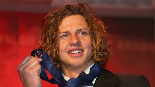 All smiles with his Brownlow medal.