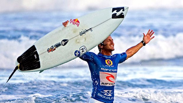 Andy Irons celebrates victory in the Rip Curl Pro in 2006.