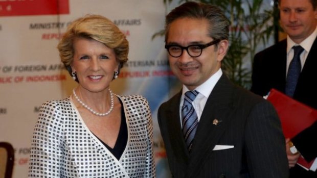 Indonesian Foreign Minister Marty Natalegawa, pictured with his Australian counterpart Julie Bishop, says "issues" remain between the two countries.