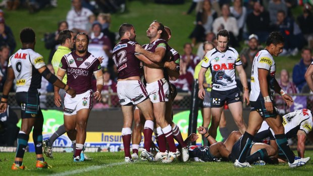 Brett Stewart celebrates with his teammates after scoring a try during the match between the Manly Sea Eagles and the Penrith Panthers at Brookvale Oval on May 18.