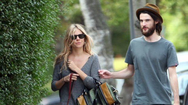Sienna Miller and Tom Sturridge out and about earlier this year.