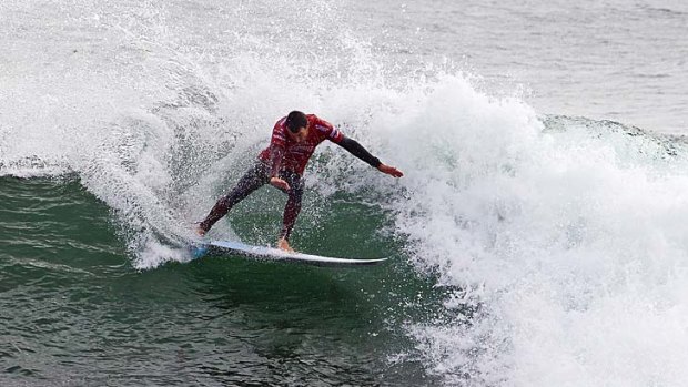Joel Parkinson on his way to winning his first-round heat at the O'Neill Cold Water Classic surfing event in Santa Cruz, California.