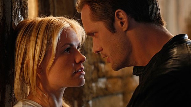 Alexander Skarsgard and True Blood co-star Anna Paquin on set.