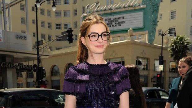 President of the Ponds Institute? ... Anne Hathaway smartens up her look.